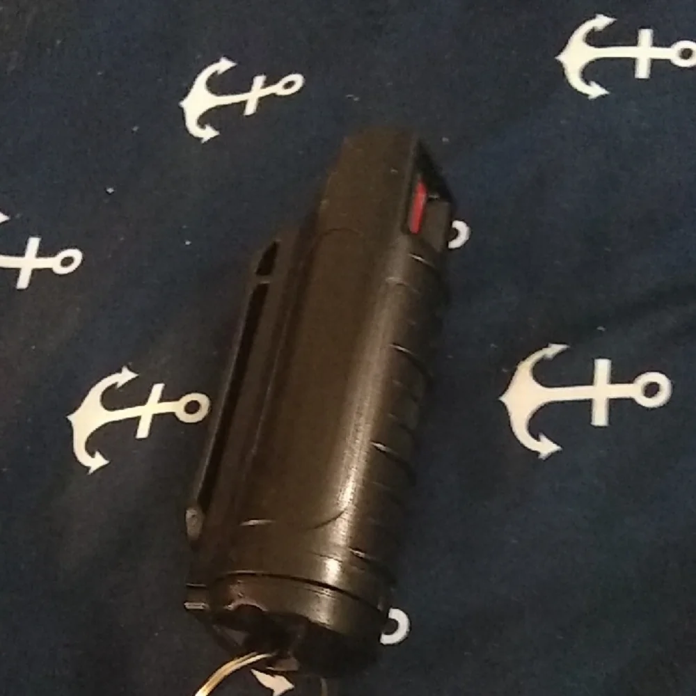 Black Pepper Spray with Red Trigger